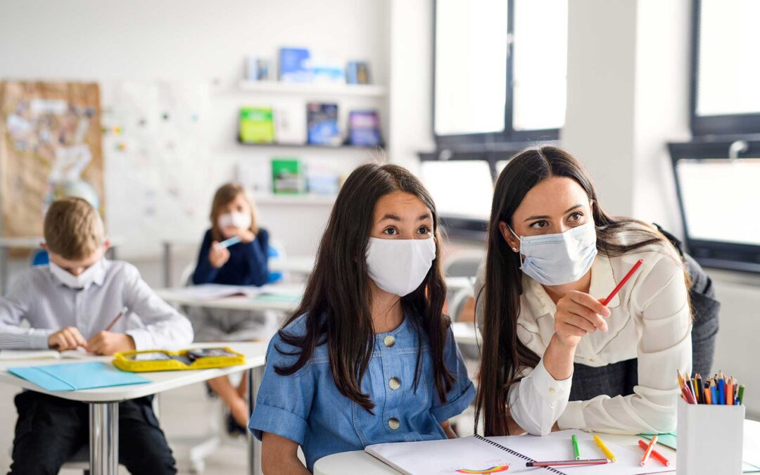 Mascherina e ventilazione possono fermare il contagio in classe