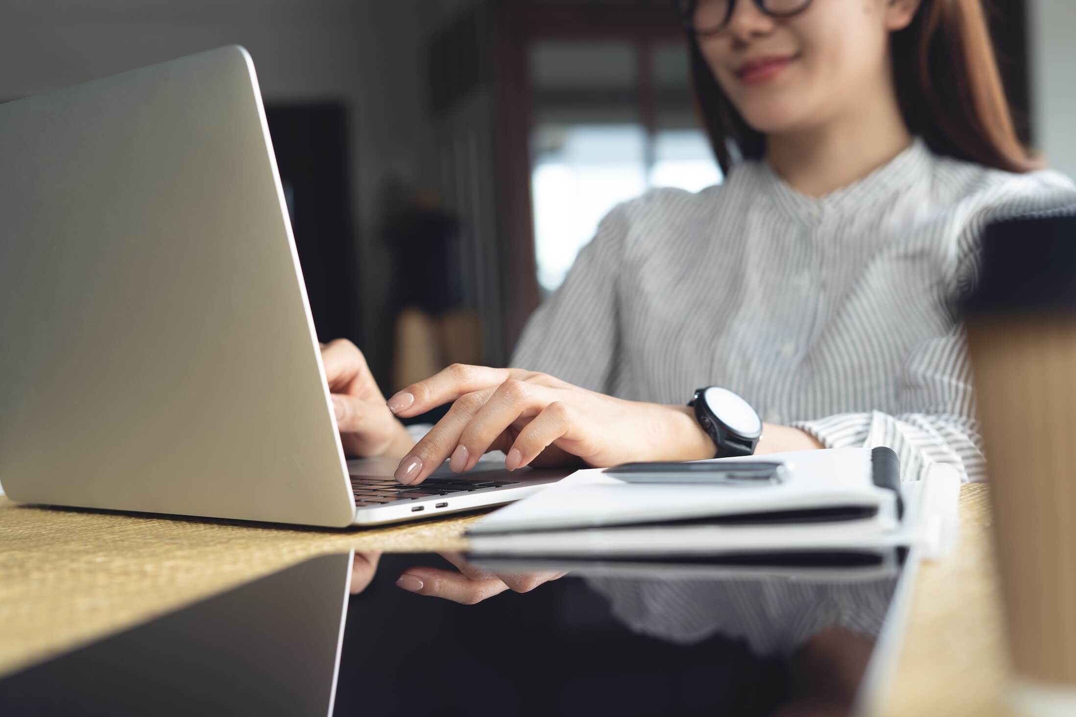 Young,Asian,Business,Woman,Working,On,Laptop,,Surfing,Internet,,Remote