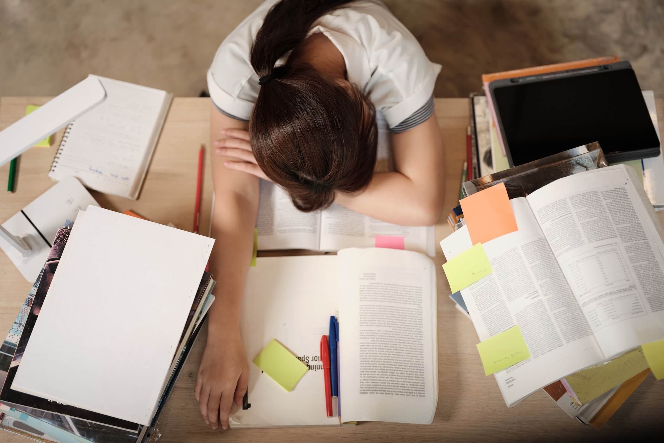 College,Asian,Teenage,Girl,Tired,And,Burned,Out,From,Overwhelmed